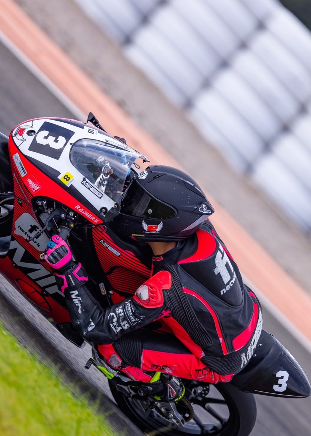 Josh seen from above on the MIR bike, with markers on the helmet, leathers, bike fairing and tail.
